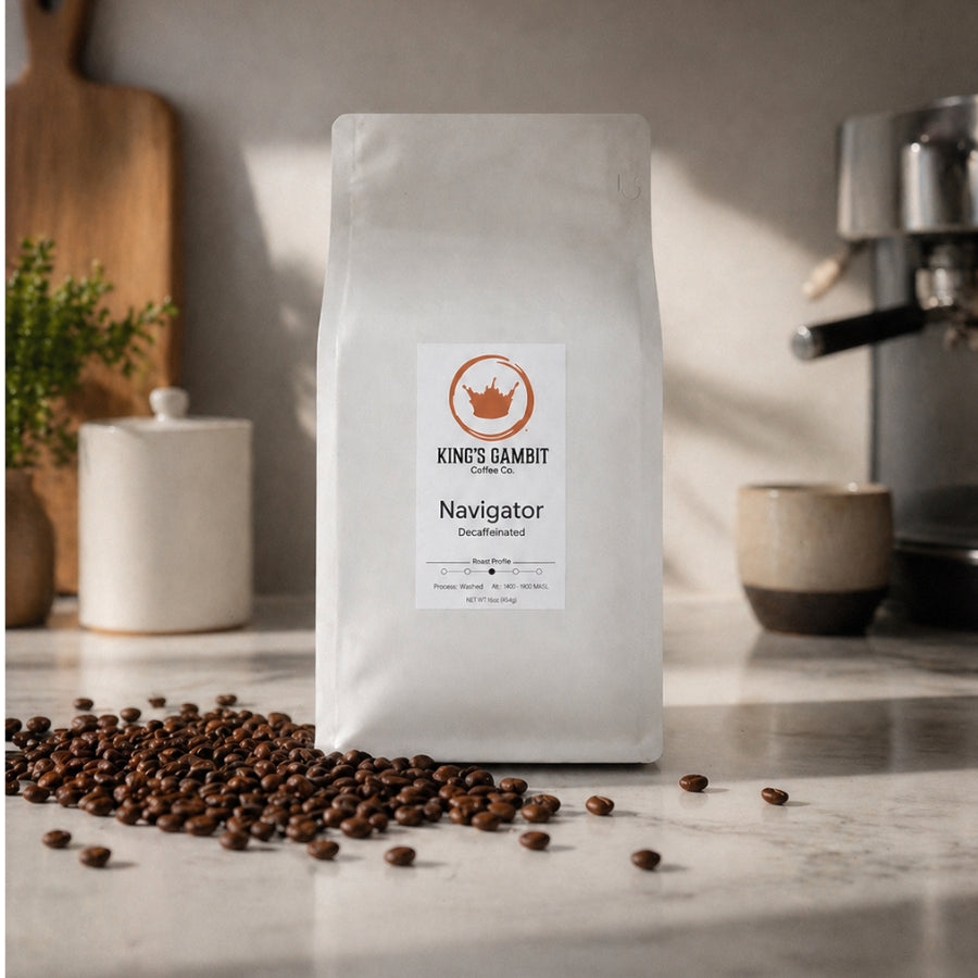 Decaffeinated medium roast coffee from King's Gambit Coffee showing a bag with coffee beans and branding details.
